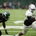 EMU junior running back Ryan Brumfield scores a touchdown during spring practice on Sunday, April 14. AnnArbor.com I Daniel Brenner
